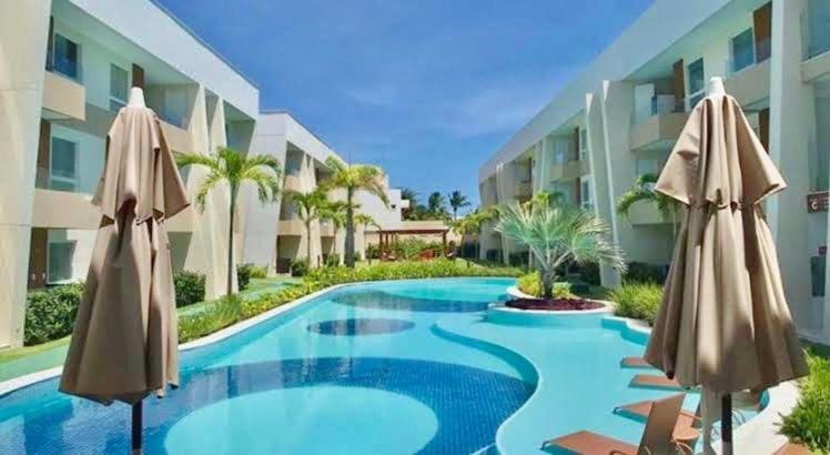 Guarajuba - Porto Smeralda 2 Suites Camacari Exterior photo